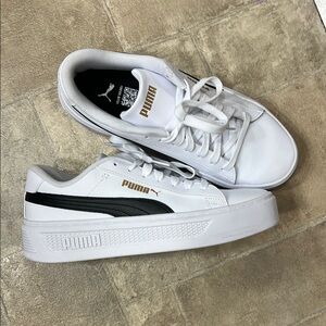 Puma White Sneakers with Black and Gold Accents